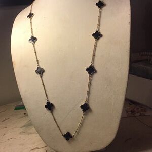 Elegant Black and Gold Clover Necklace